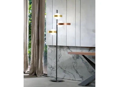 Lampada da terra Bubble PT formata da tre anelli in metallo verniciato e tre bulbi in vetro bianco satinato di Riflessi