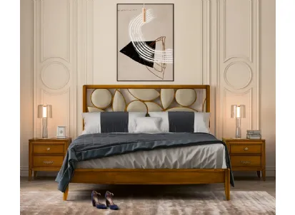 Letto Incanto in legno con testiera in pelle di Le Fablier