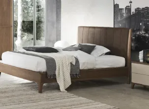 Letto in legno con testiera imbottita e rivestita in pelle Nirvana di Le Fablier