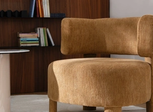 Poltroncina rivestita in tessuto Glen Soft di Calligaris