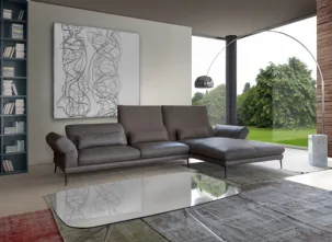 Divano in pelle con inserti in microfibra con penisola Paride di Calia