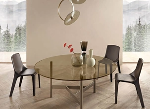 Tavolo rotondo Agos con top in vetro e base in metallo di Fiam