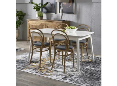 Tavolo rettangolare sagomato allungabile Amante realizzato in agglomerato e legno massello finitura White di Dialma Brown