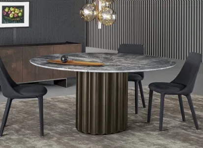 Tavolo Dorian Table con top in marmo e base in poliuretano finitura bronzo spazzolato di Bonaldo