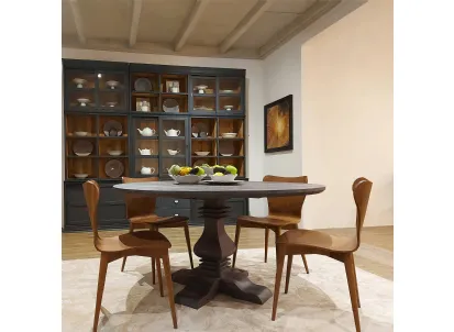 Tavolo tondo Dorton realizzato in legno stratificato e legno massello di Conifera finitura Dark Grey di Dialma Brown