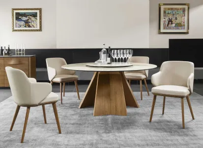 Tavolo rotondo con piano in ceramica e basamento in legno Icaro di Calligaris