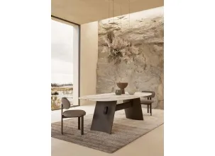 Tavolo con piano in marmo e struttura in metallo finitura bronzo Wave Nature Design
