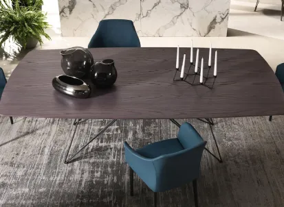 Tavolo Pegaso con top in legno di Riflessi