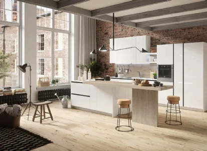 Cucina Design con isola centrale in materico rovere e laccato lucido First di Snaidero
